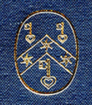 Gold stamp on blue cloth of the logo of the Research Group on Manuscript Evidence. Detail from the front cover of Volume II of 'The Illustrated Catalogue'