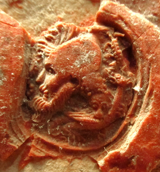 The red wax seal seen upright, with the male human head facing left. Document on paper issued at Grenoble and dated 13 February 1345 (Old Style). Image reproduced by permission
