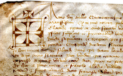 Detail at top left of a document of 1437 from Chambèry in France, with the cross-surmounted notarial sign at the start of the text. Reproduced by permission.