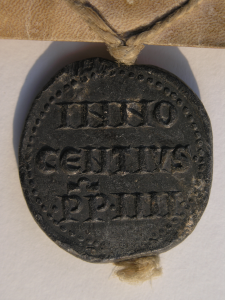 Reverse of Bulla of Pope Innocent IV with the inscription of his name in three lines. Photography © Mildred Budny