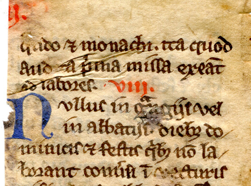 Detail of the top of the verso of the fragmentary leaf from a 13th-century copy of Statutes for the Cistercian Order. Reproduced by permission.