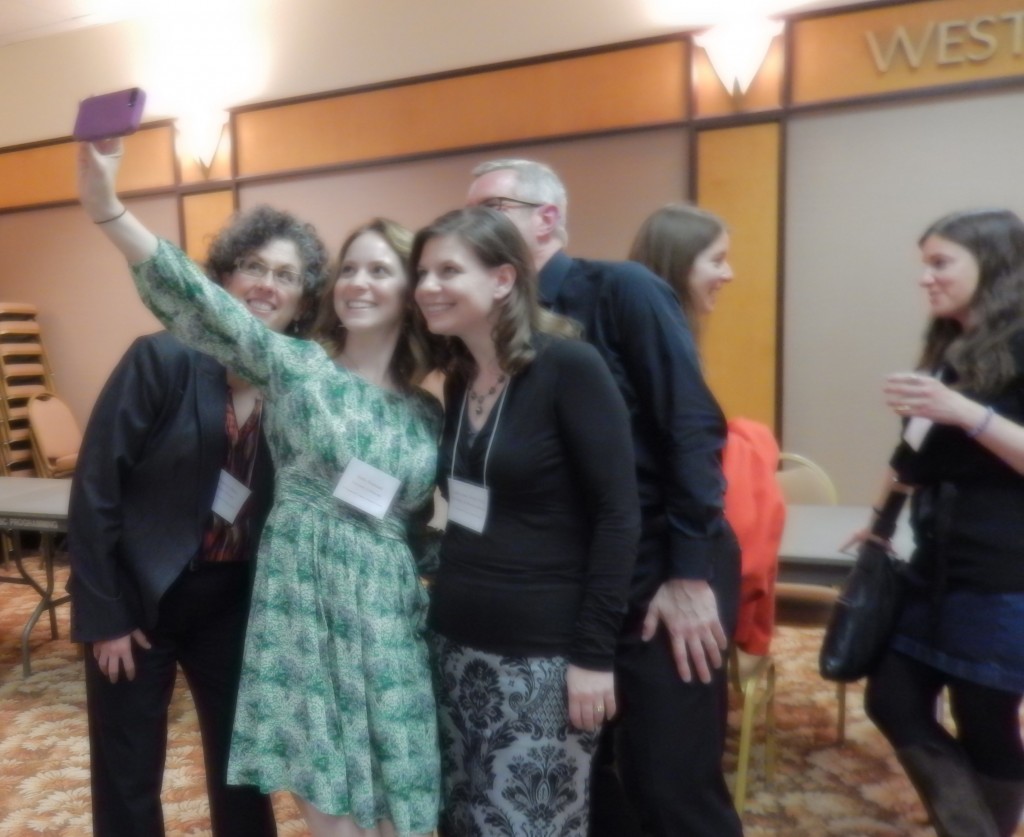 A group gathers spontaneously to enjoy a Selfie at the Co-Sponsored Reception of the Research Group on Manuscript Evidence and the Index of Christian Art at the 2016 International Congress on Manuscript Studies. Photography © Mildred Budny.