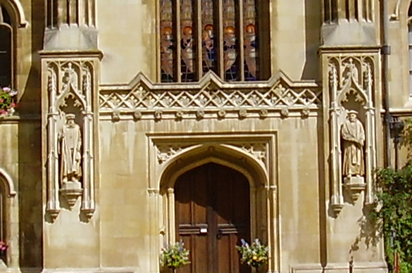 Matthew Parker stands outside the entrance to the Chapel in his College. August 2005. Photography © Mildred Budny.