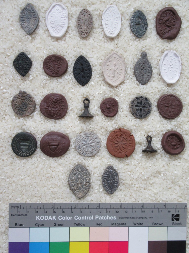 Private Collection. Set of 14 Seal Matrices accompanied by Specimens of their Seals. Photograph by Mildred Budny.