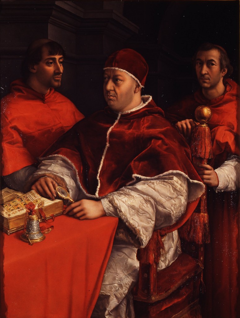 Portrait by Raphael Sanzio (circa 1518) of Pope Leo X and his First Cousins, Cardinals Giulio de' Medici (later Pope Clement VII) and Luigi de' Rossi. Uffizi gallery, Florence. Via Creative Commons.