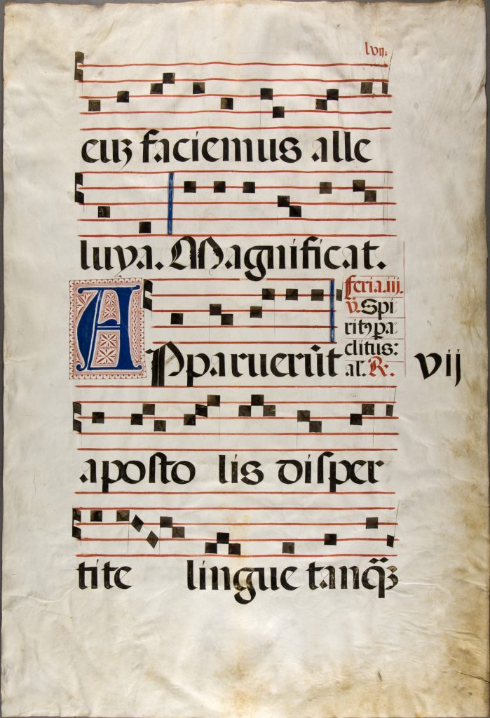 Vassar College Libraries, Medieval and Early Modern Manuscript Collections, Archives and Special Collections (ASC), Item 69, recto. Leaf from an Antiphonary, including the text for the celebration of Pentecost in the Missal. The musical notation is set out on 5-line stages and the opening inset blue initial of A for 'Appareunt' has a rectangular bed of red decoration.