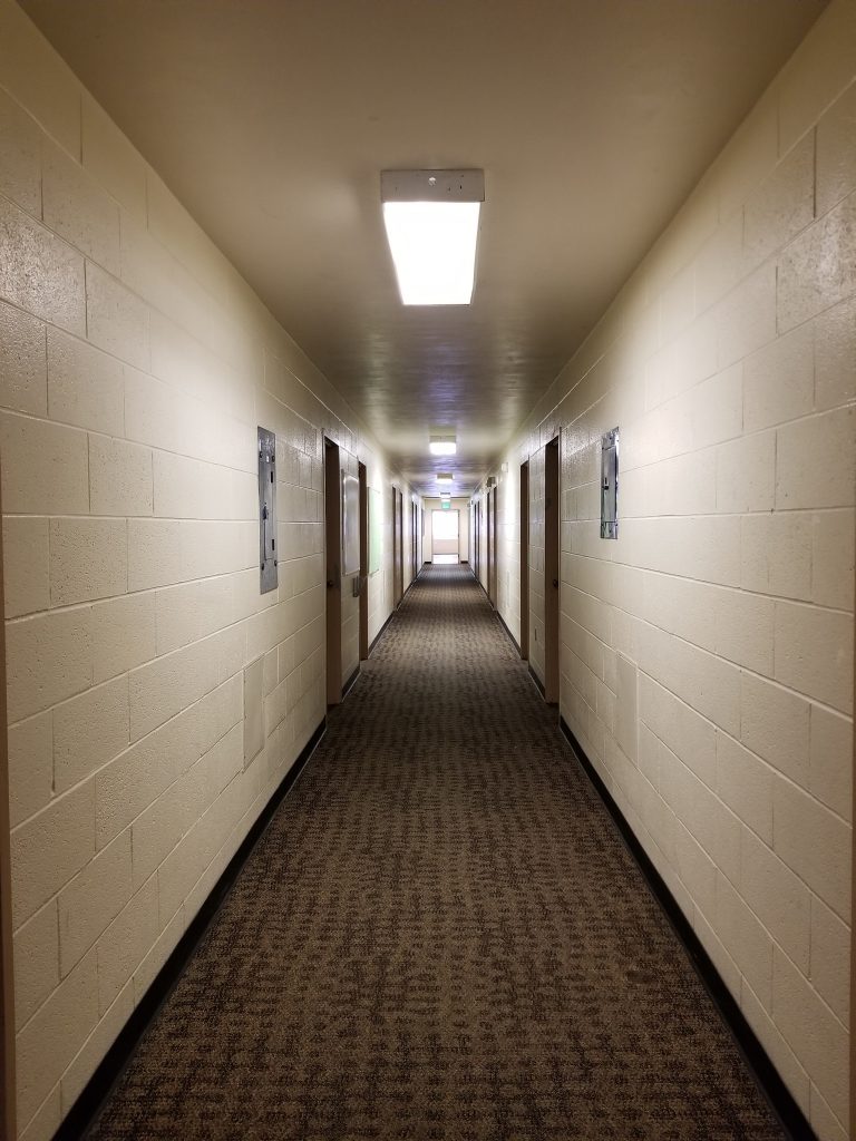 At the End of the 2019 Congress. A view down the dorm corridor, with Light at the End of the Tunnel.