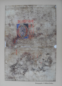 Italian Bible leaf recto within former mat. Photography © Mildred Budny