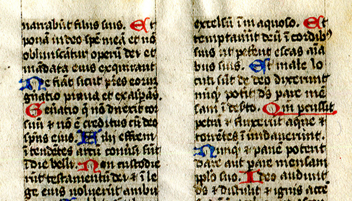 Folio 6 recto, with the top lines of the double columns carrying parts of the text of the Vulgate Psalm, with alternately colored initials beginning the verses, which run together in long lines. Reproduced by permisison.