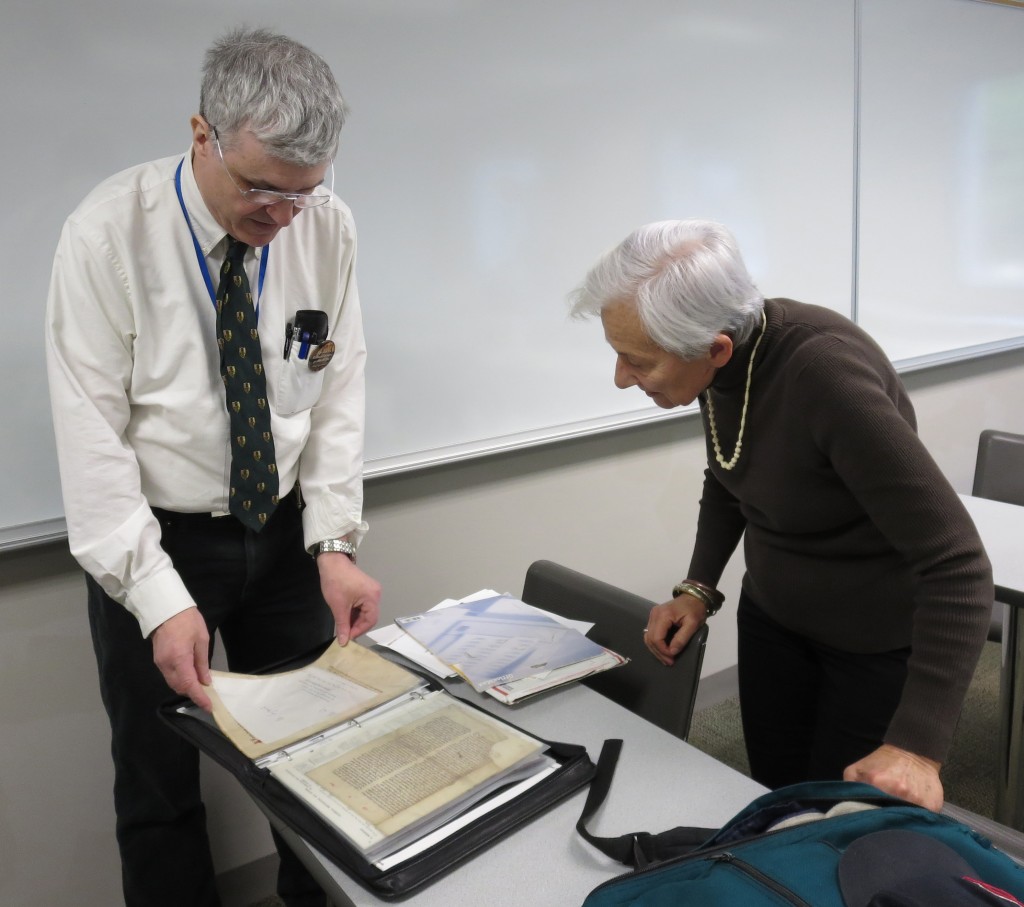 Examining original manuscript materials at the Session on 'Paper or Parchment' at the 2016 International Congress on Medieval Studies. Photograph © Mildred Budny