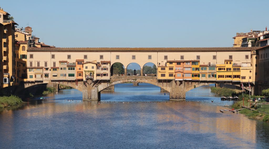 Florence, Italy, Ponte Vecchio from Ponte alle Grazie. Photo: Ingo Mehling, CC BY-SA 4.0 <https://creativecommons.org/licenses/by-sa/4.0>, via Wikimedia Commons
